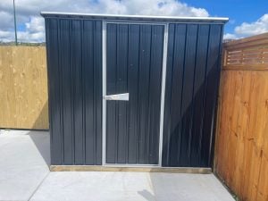 Black single door shed in Tauranga