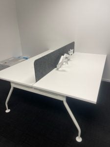 White 2 person office desk with privacy screen in Tauranga