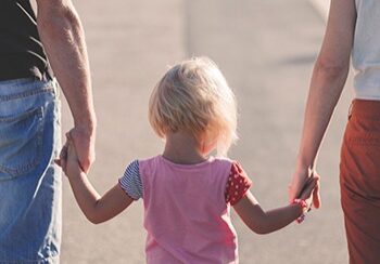 Make time for Life Preview Child holding hands with parents