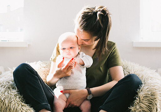 Make time for life square Woman holding baby